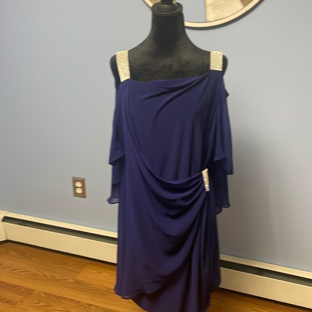 Blue cocktail dress with diamonds. Only wore once. Like new, smoke free home.